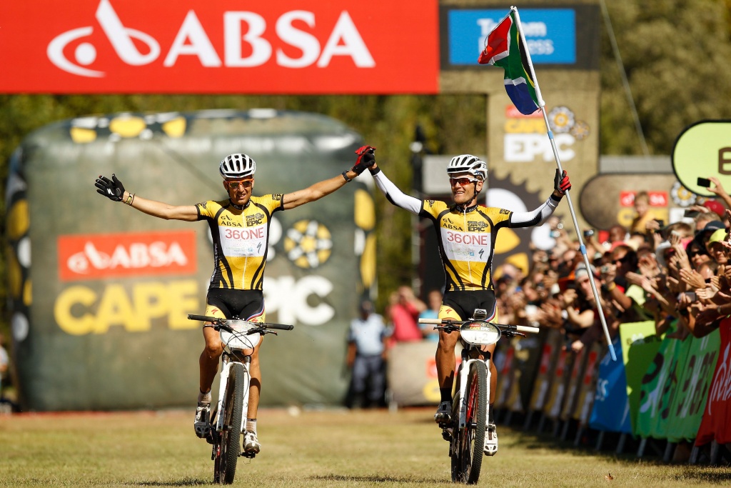 2012 Absa Cape Epic Winners Christoph Sauser and Burry Stander of 36One-Songo-Specialized celebrate during the final stage (stage 7) of the 2012 Absa Cape Epic Mountain Bike stage race held from Oak Valley Wine Estate in the Elgin Valley to Lourensford Wine Estate, South Africa on the 1 April  2012 Photo by Sven Martin/Cape Epic/SPORTZPICS