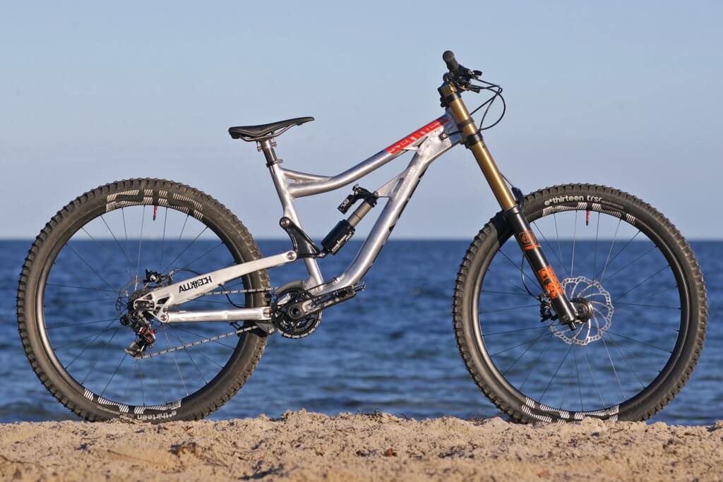 Alutech_Sennes-DH-29_204mm-alumiunum-production-downhill-bike_driveside-beach